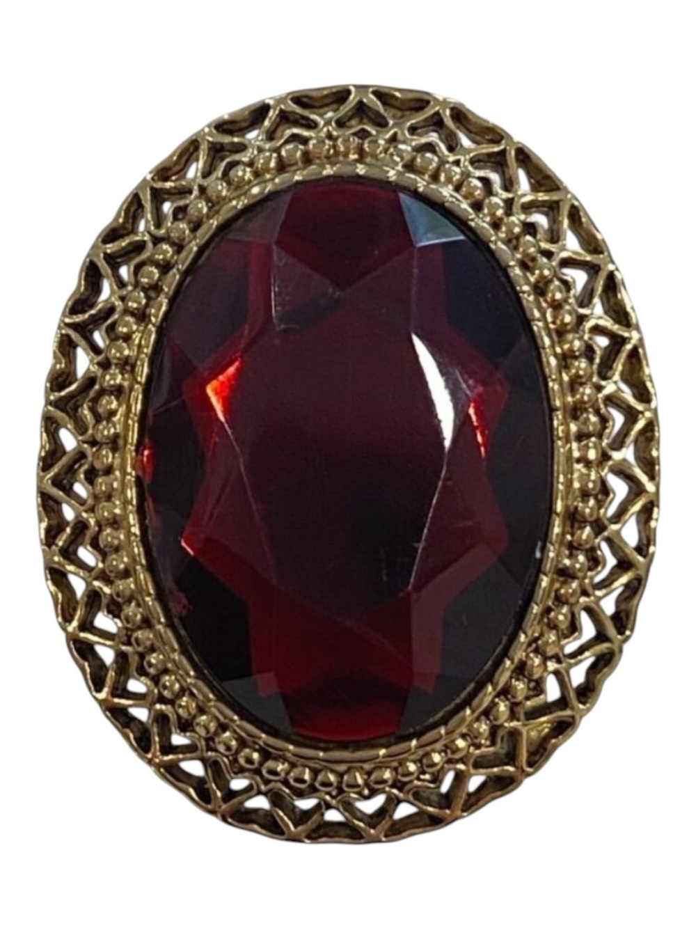 Vintage Gold-Tone Oval Brooch With Red Faceted Stone And Filigree Detailing